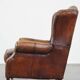 Fauteuil à oreilles en cuir de mouton