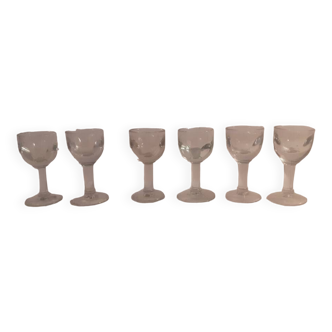 Set of 6 old digestive glasses on foot