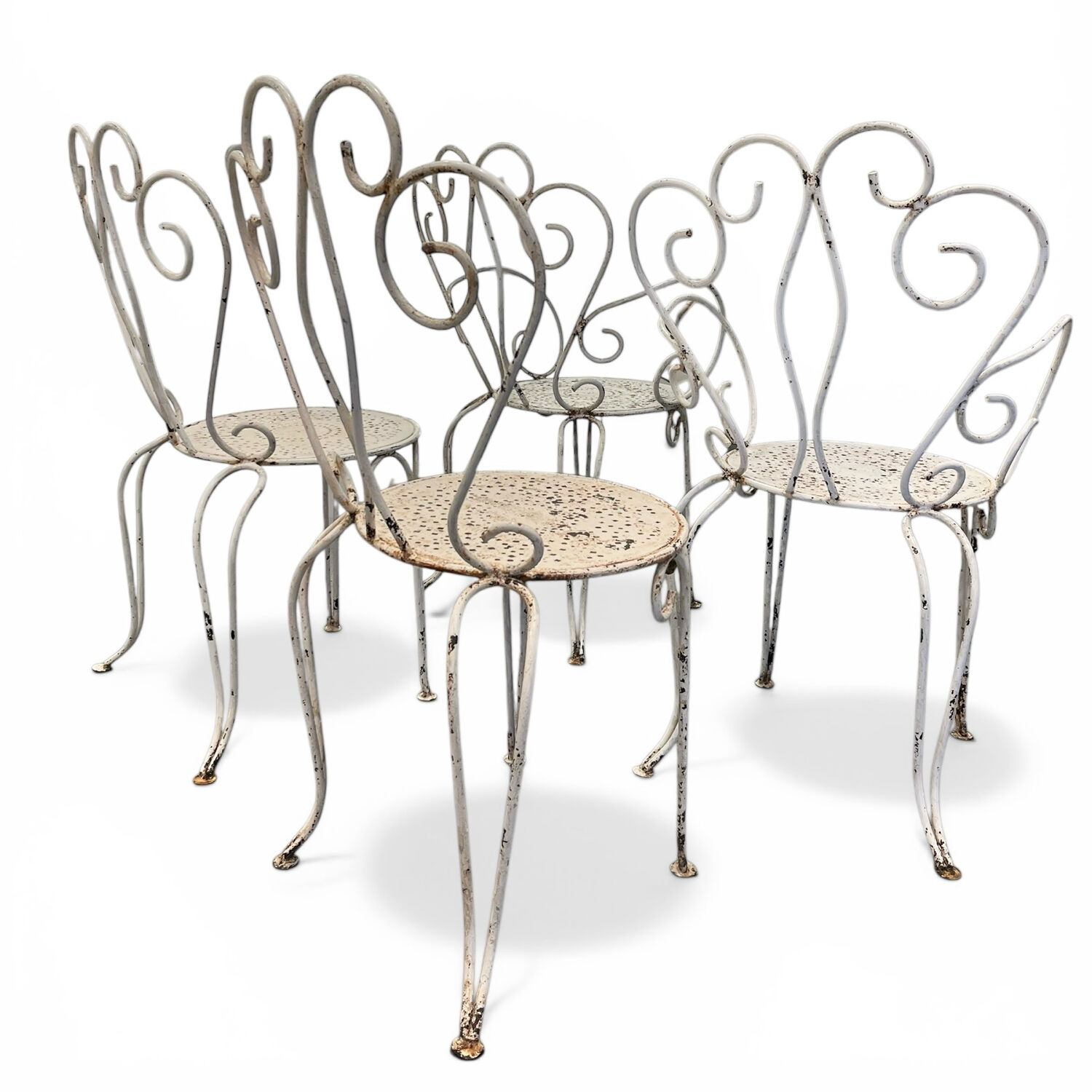 Set of 4 white wrought iron garden chairs, 1950s.