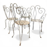 Set of 4 white wrought iron garden chairs, 1950s.