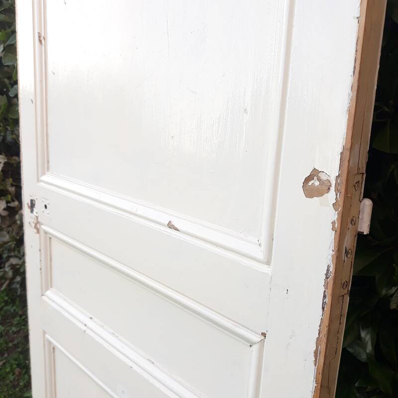 Communication door H220xW80.5cm, old panelled with moulding.