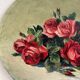 Old oil painting on oval wood with roses thrown from the 30s
