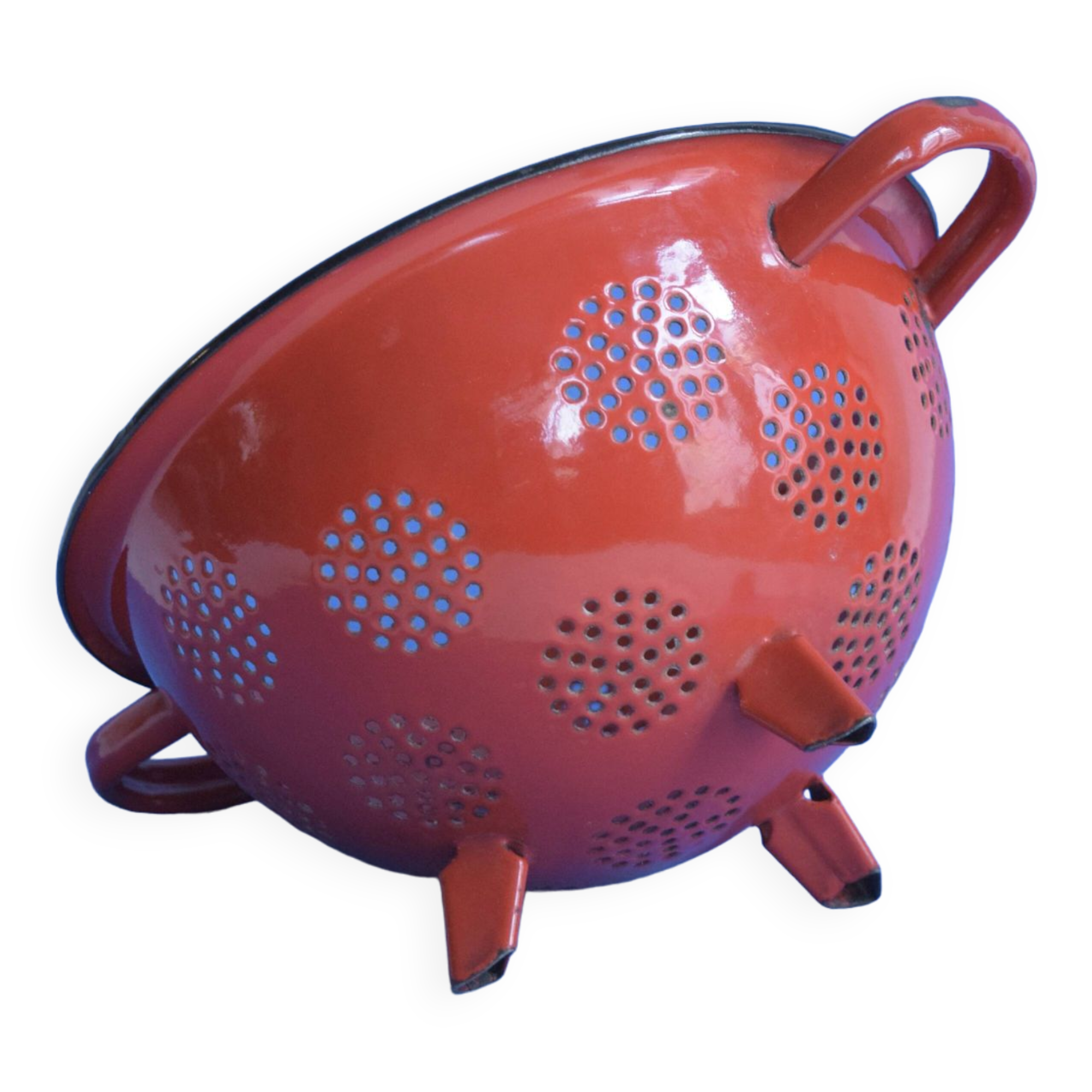 Vintage red enameled sheet metal colander