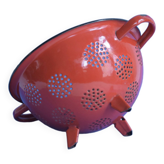 Vintage red enameled sheet metal colander