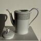 Bavarian porcelain teapot from Germany with blue frieze and flower lid H23