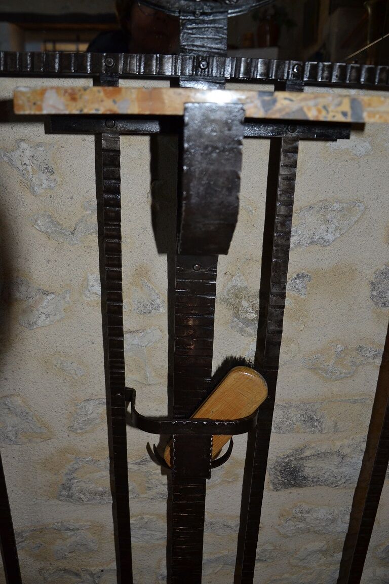 Wrought iron wardrobe with oval mirror