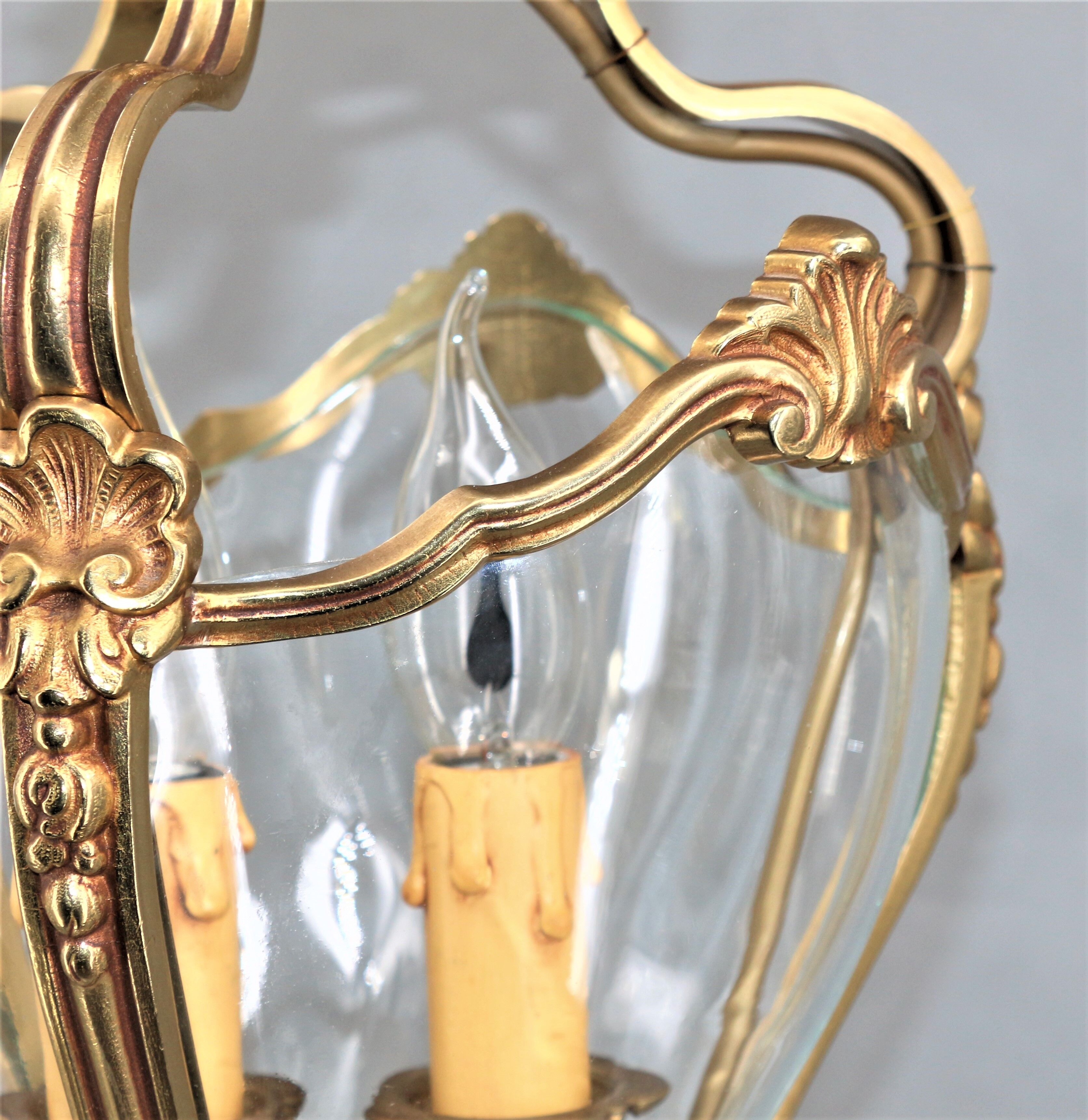 Lustre en bronze et verre bombé