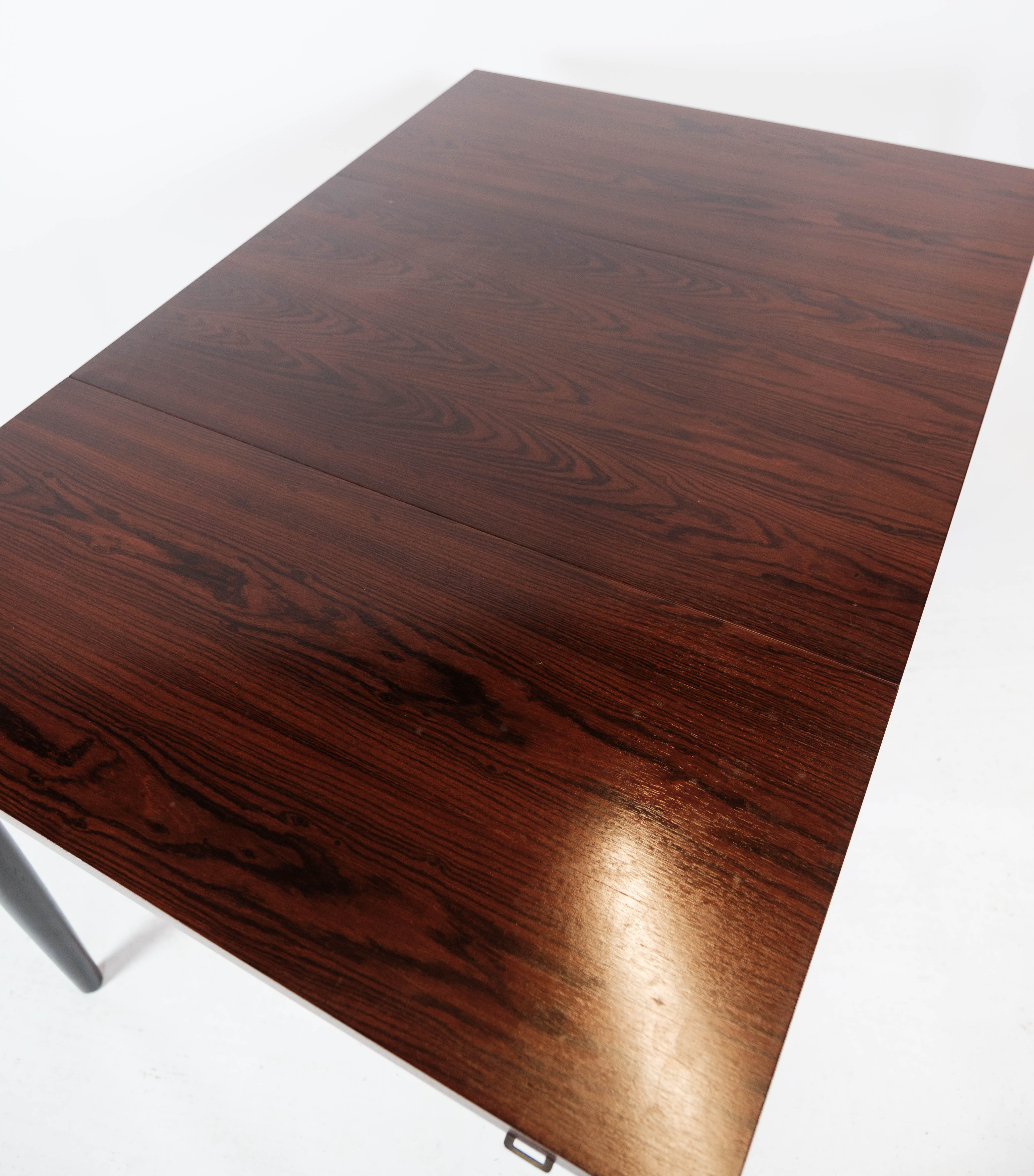 Dining table in rosewood with extension plates, designed by Arne Vodder, 1960s