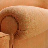 Deep seated armchair in the style of Howard & Sons