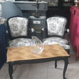 Table basse style Louis XV pieds escargots noir plateau brut