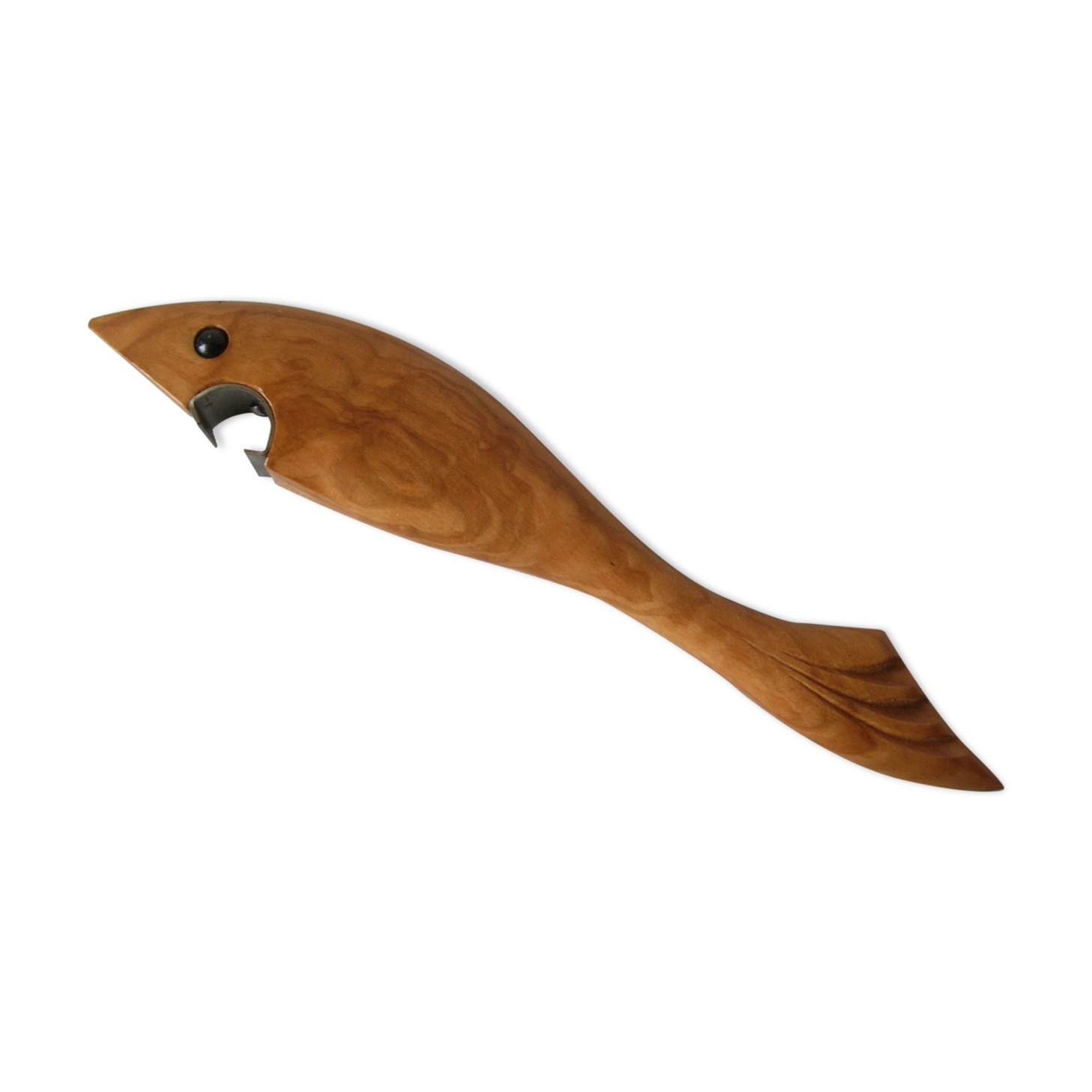 Old bottle opener in the shape of shark wooden fish kitchen utensil