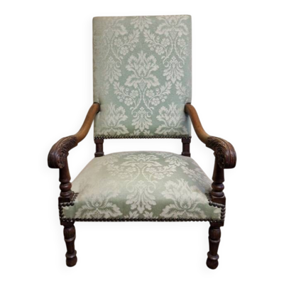 Ancien fauteuil de style Louis XIV en bois mouluré et tissu façon damassé