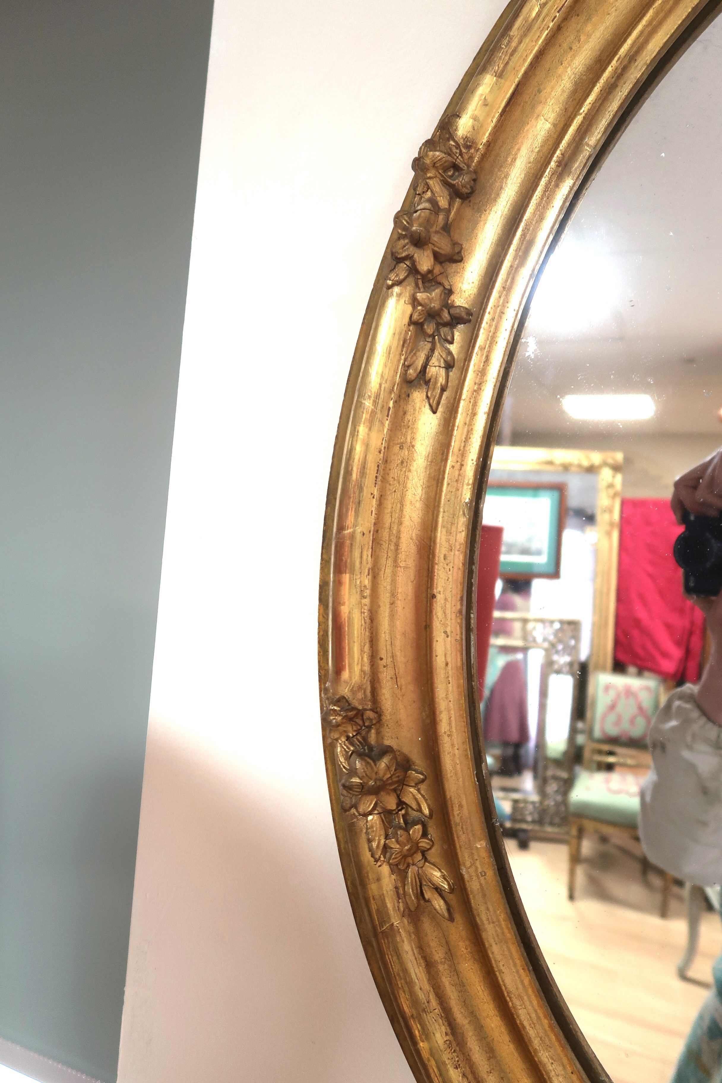 Oval mirror in gilded wood 98x63 cm