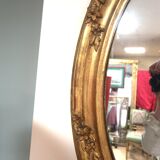 Miroir ovale en bois doré 98x63 cm