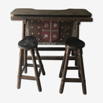 Medieval style bar furniture and two stools
