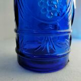 cobalt blue molded glass bottle in relief decoration bunches of grapes