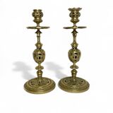 Pair of bronze torches chiseled with foliage, 19th century