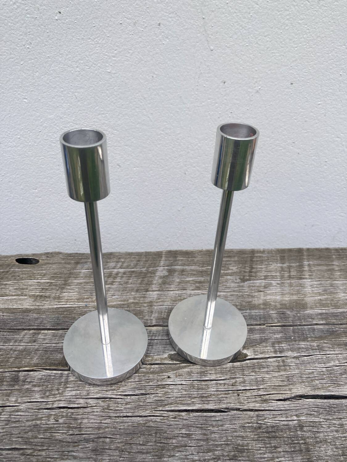 Pair of modernist aluminum candlesticks