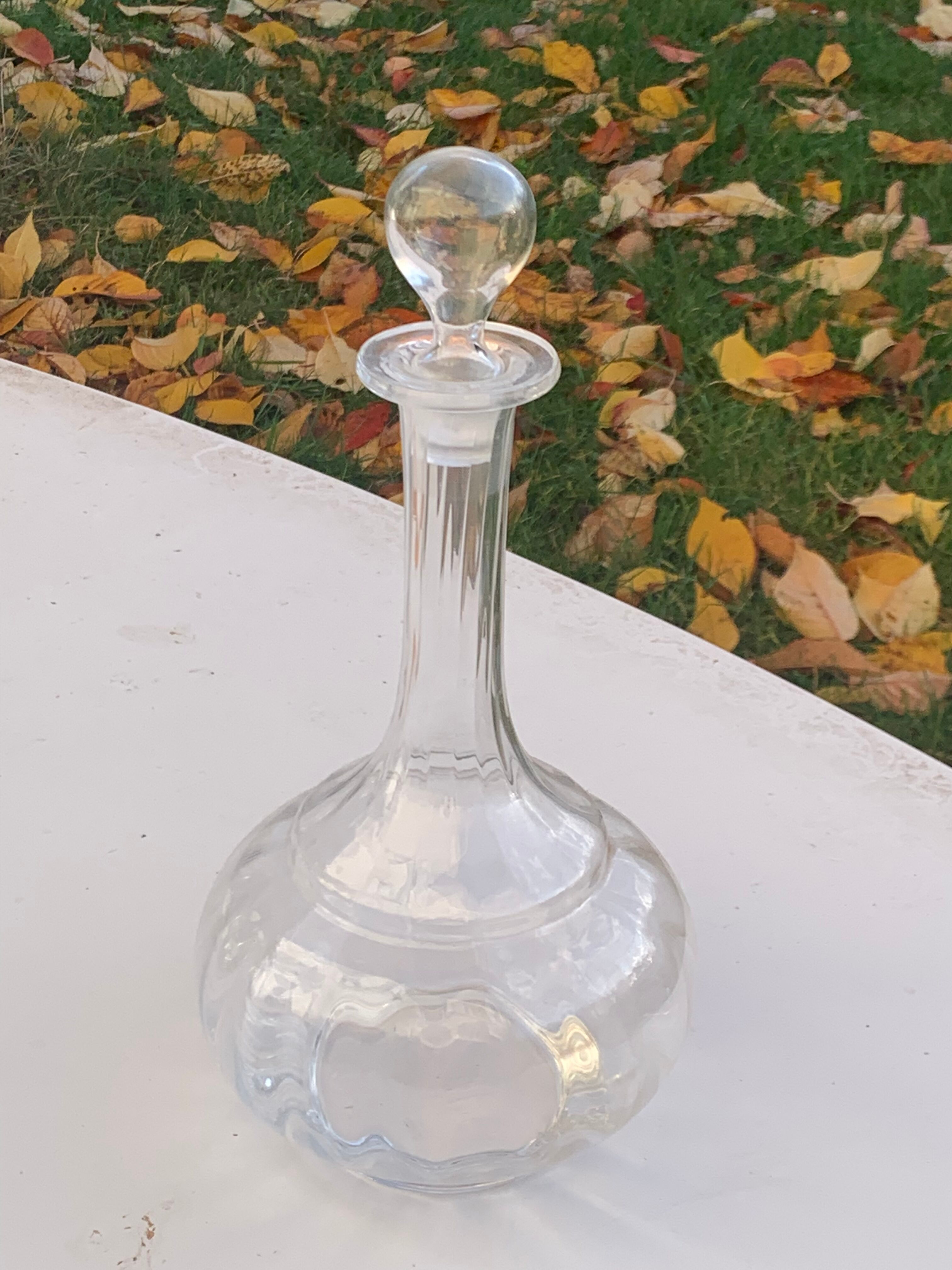Elegant and vintage transparent glass wine decanter