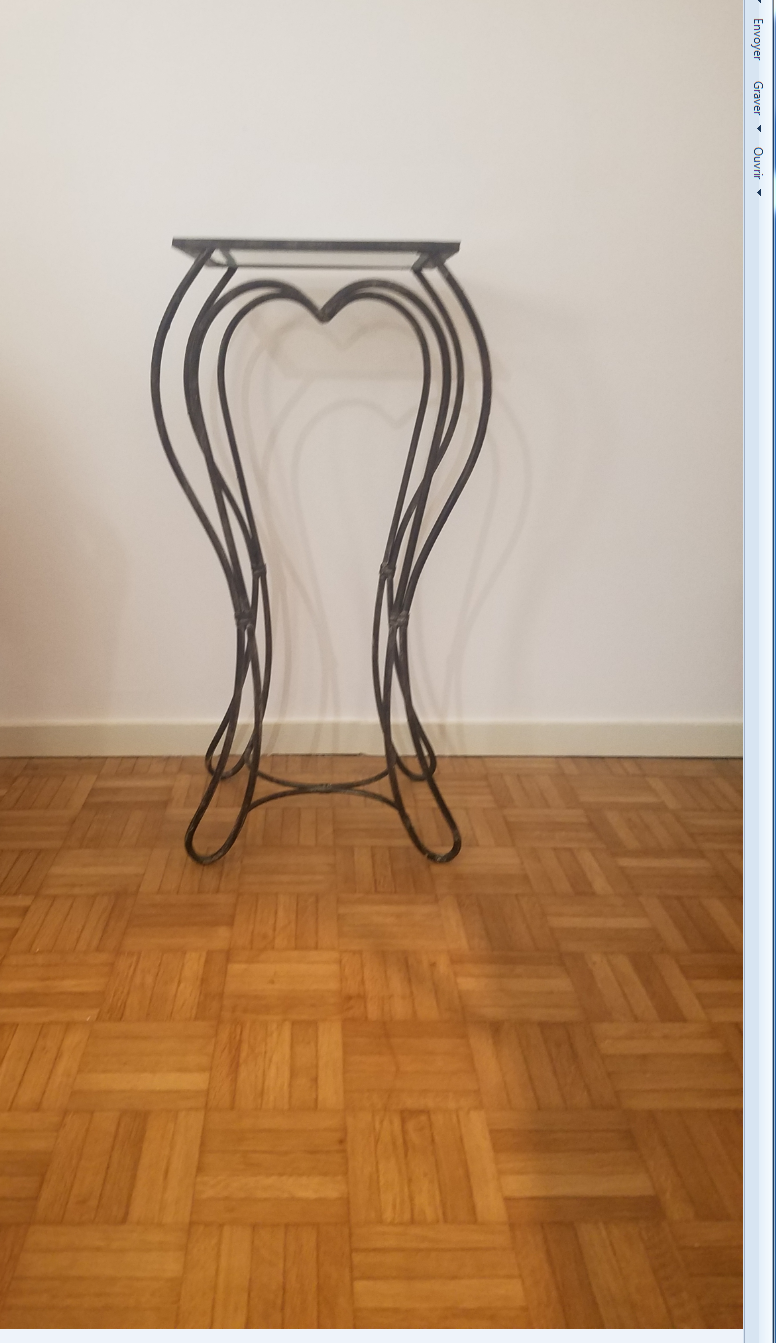 Wrought iron pedestal table