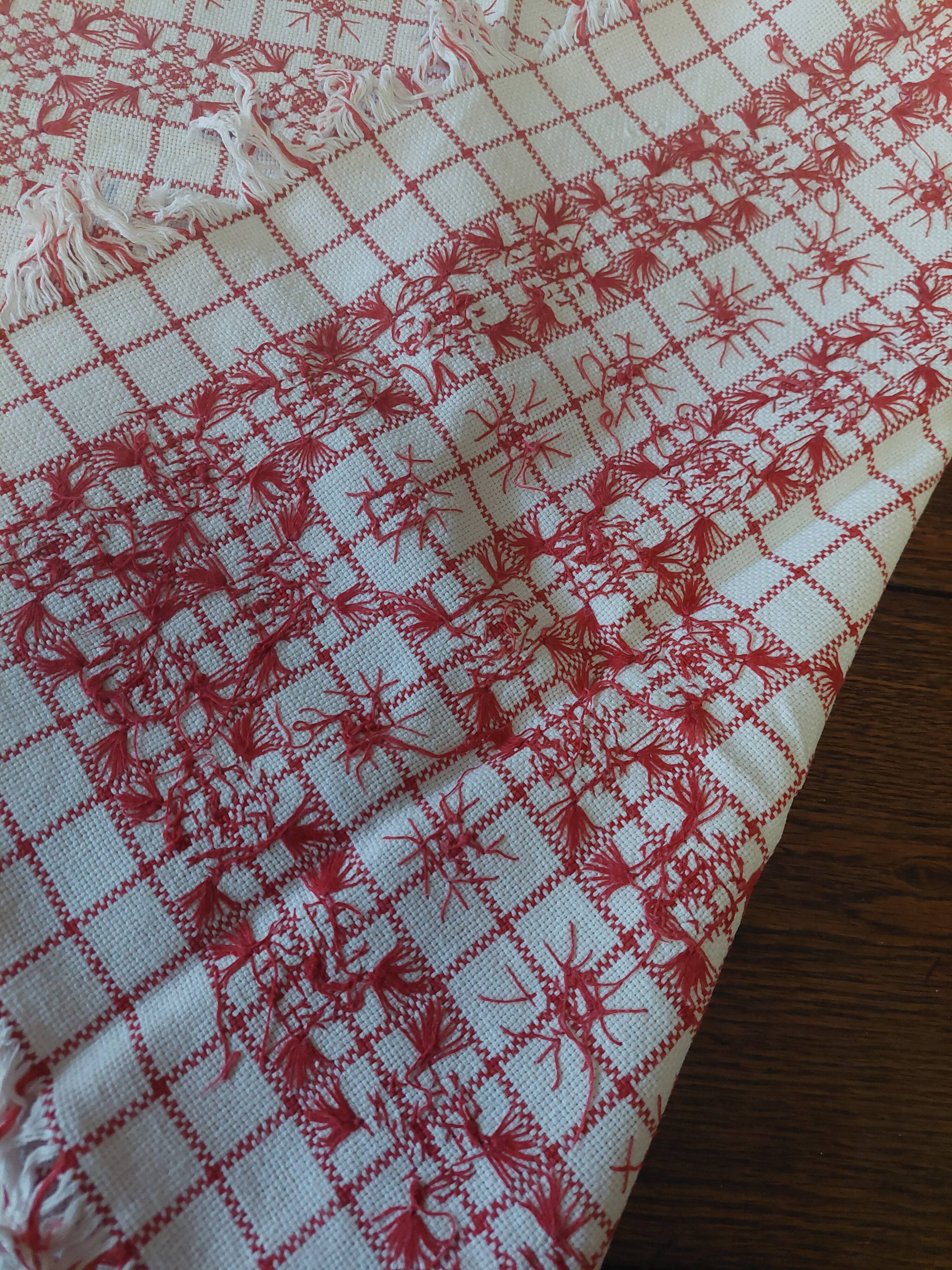 Red checkered cotton tablecloth with fringes