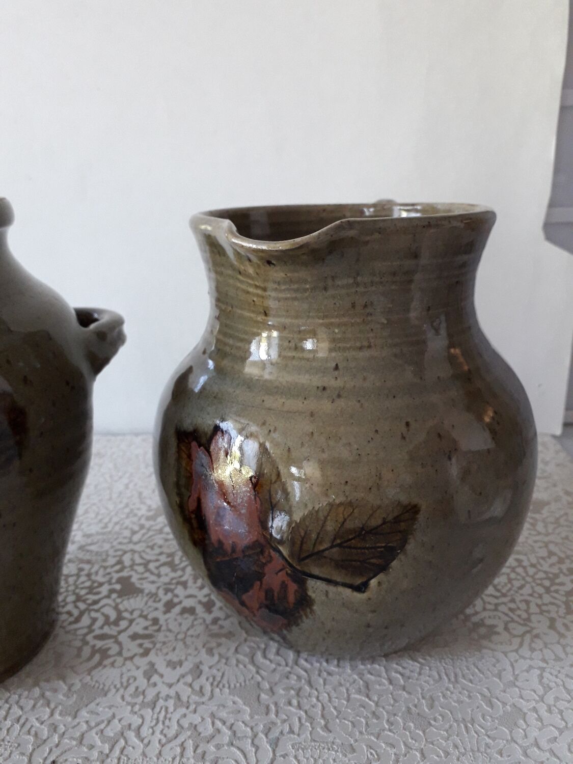 Le Rivet enamelled stoneware carafe and pot with herbarium motifs
