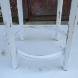 Old curved wooden stool revisited patinated white