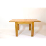 Pine dining table with extensions from the 1980s.