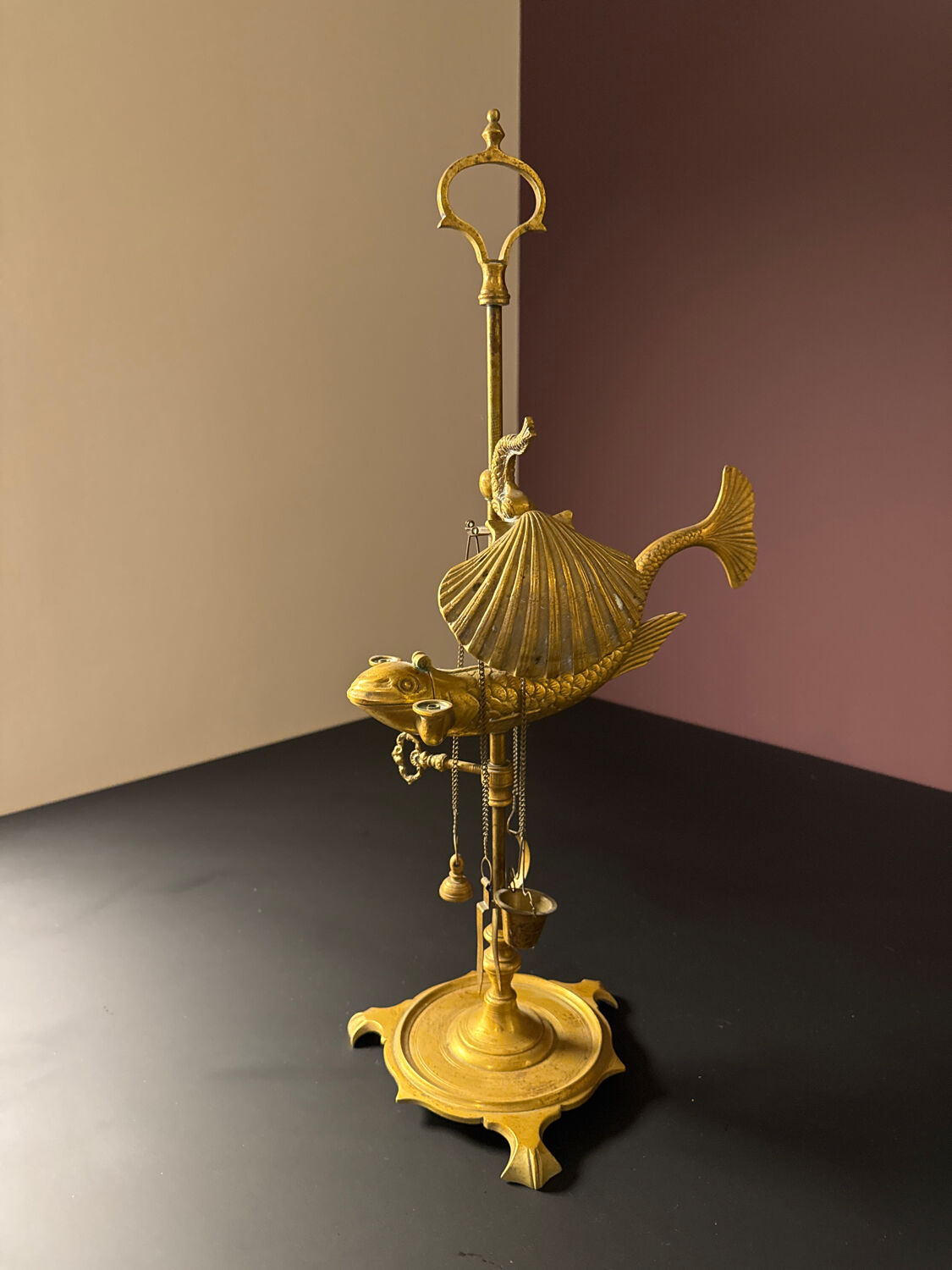 Antique brass oil lamp with fish decoration – marine object – cabinet