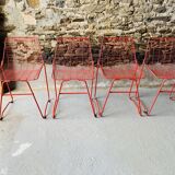 4 red design chairs