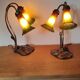 Deux lampes nénuphar en laiton et verre
