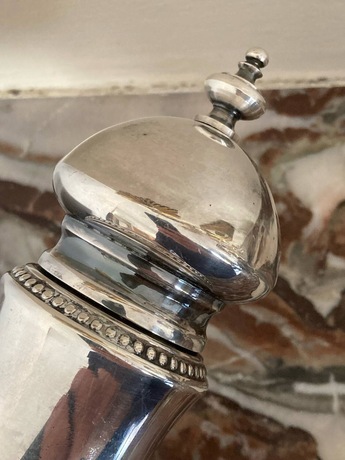 Silver metal pepper mill