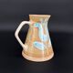 Grès breton peint main – Ensemble floral turquoise Manufacture Bretonne de