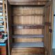Old walnut wood cabinet with hat and 2 drawer doors