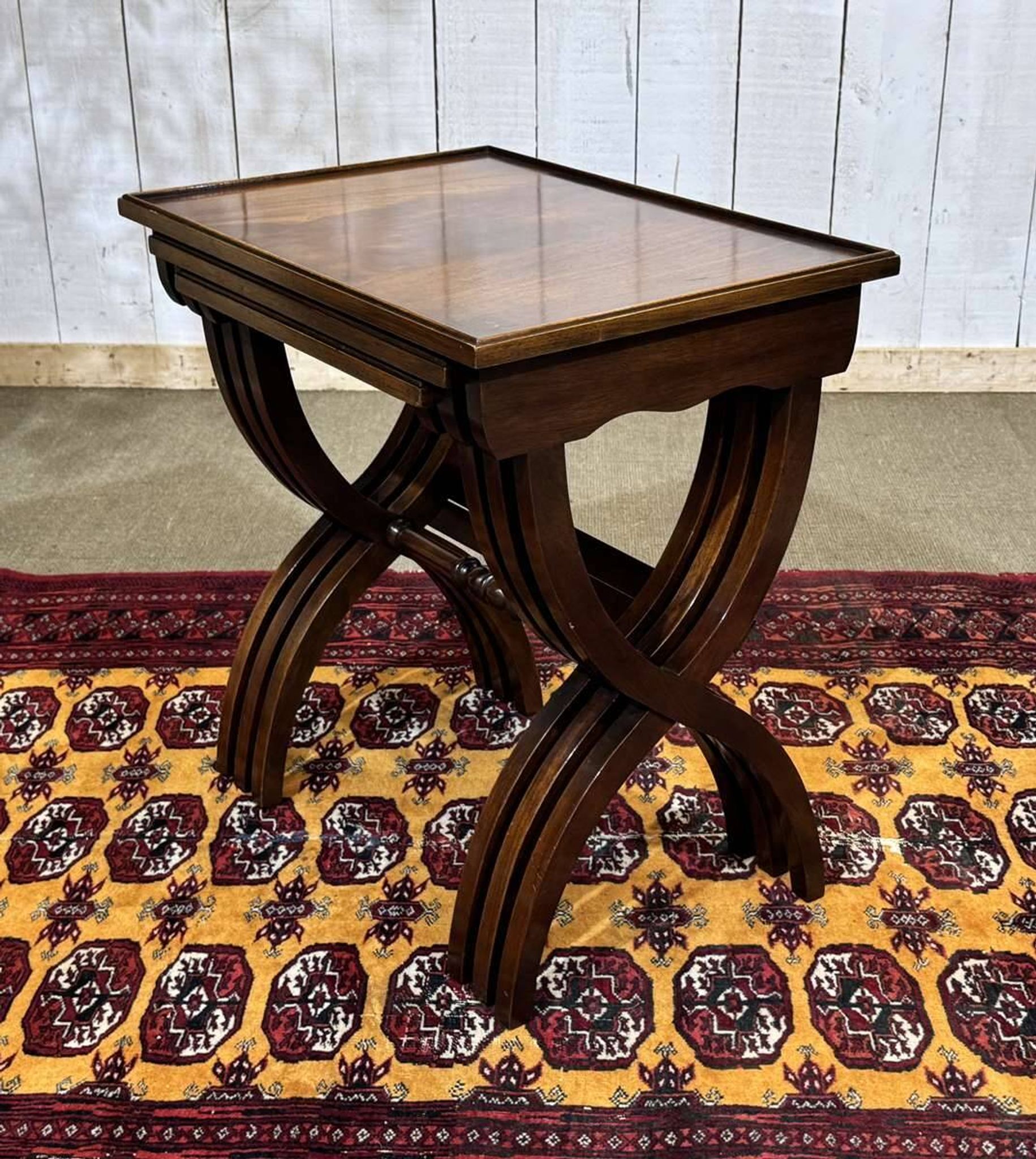 Set of English nesting tables in mahogany from the 1950s.