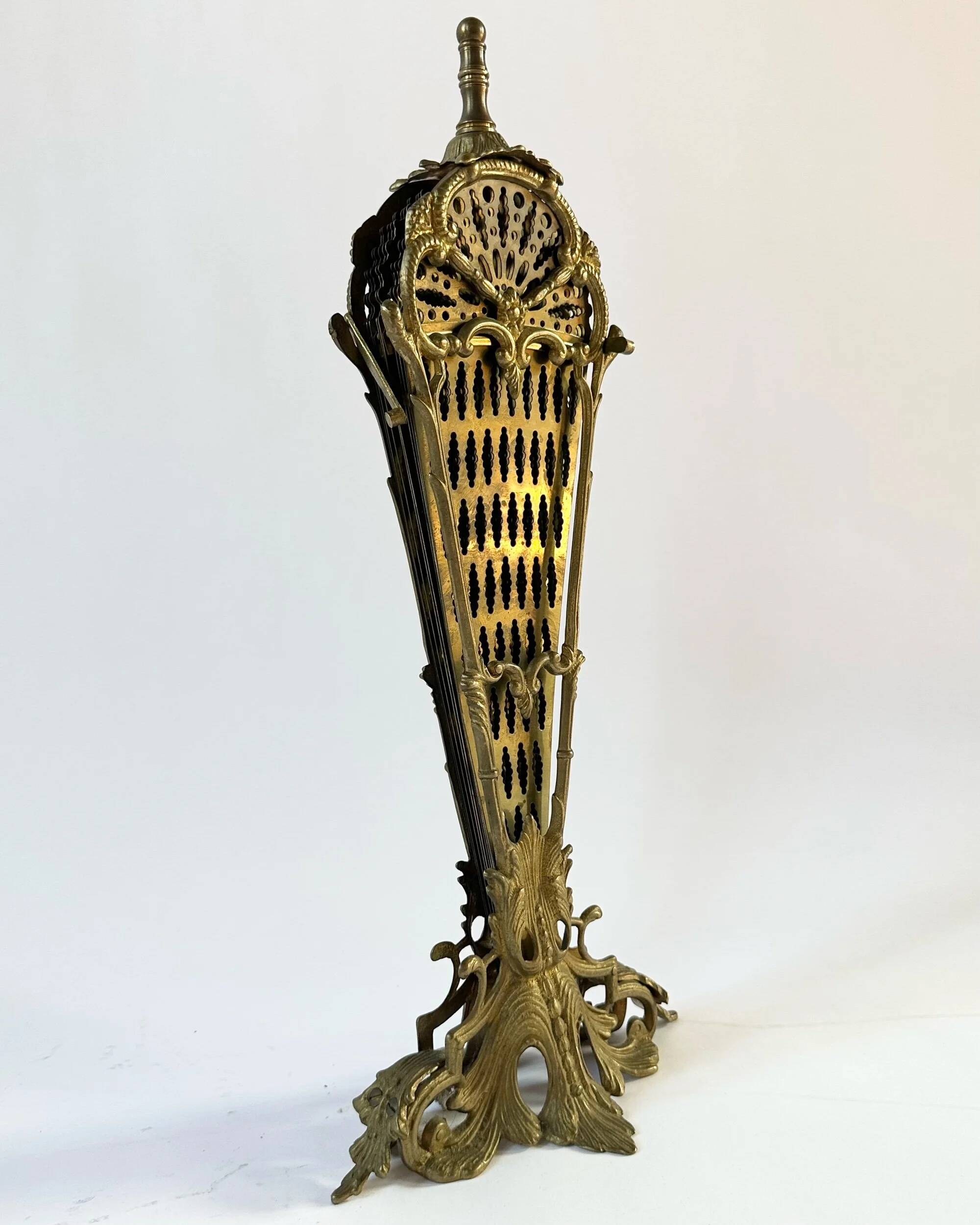 Vintage French brass fire screen, peacock design, 20th century.