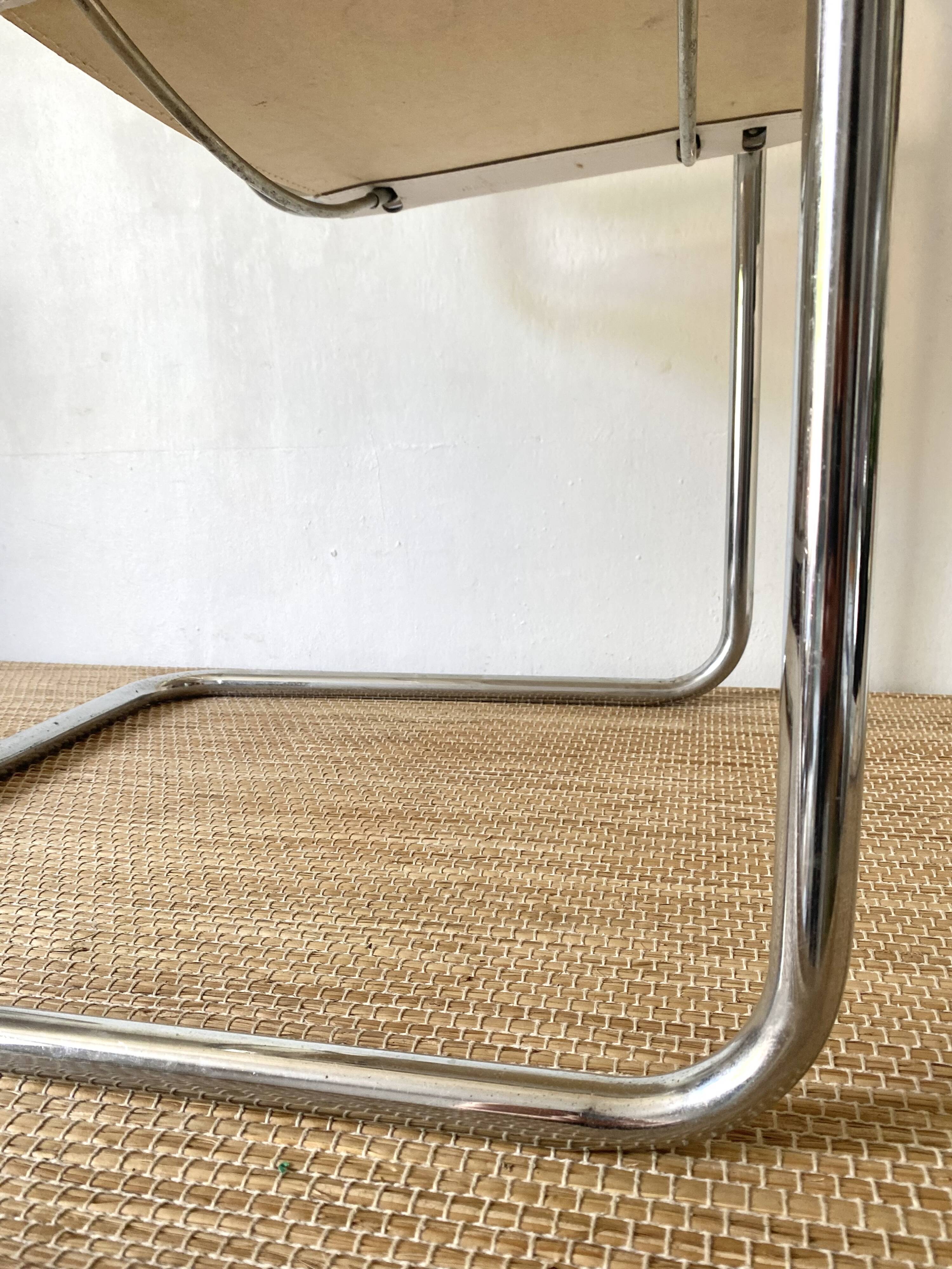 Matteo Grassi style faux leather and chrome armchair