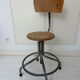 Vintage workshop chair in metal and wood, industrial style.