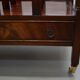 Support made of hardwood with a drawer and wheels.