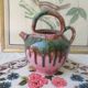 Jug pitcher Provençal earthenware glazed with pink and green glaze.