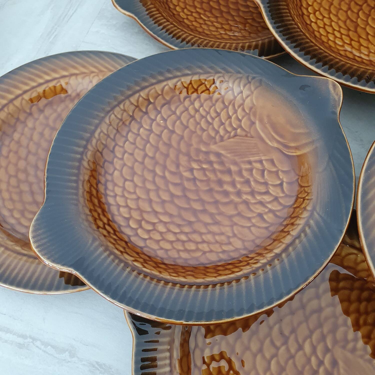 Sarreguemines / 11 earthenware fish-shaped plates