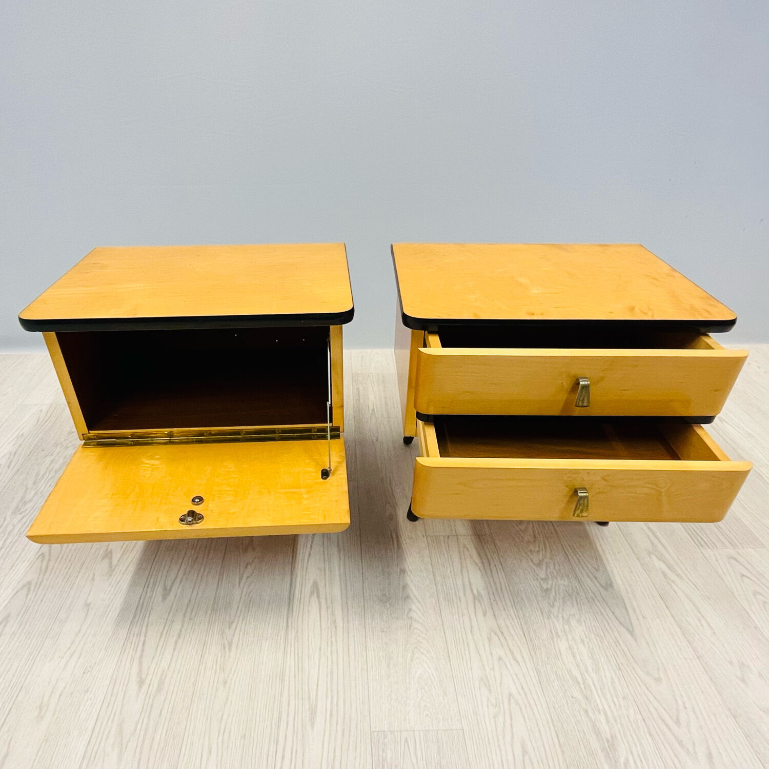 A pair of night cabinets