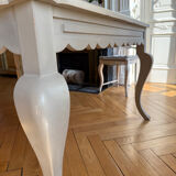 Large solid wood table made by a cabinetmaker.