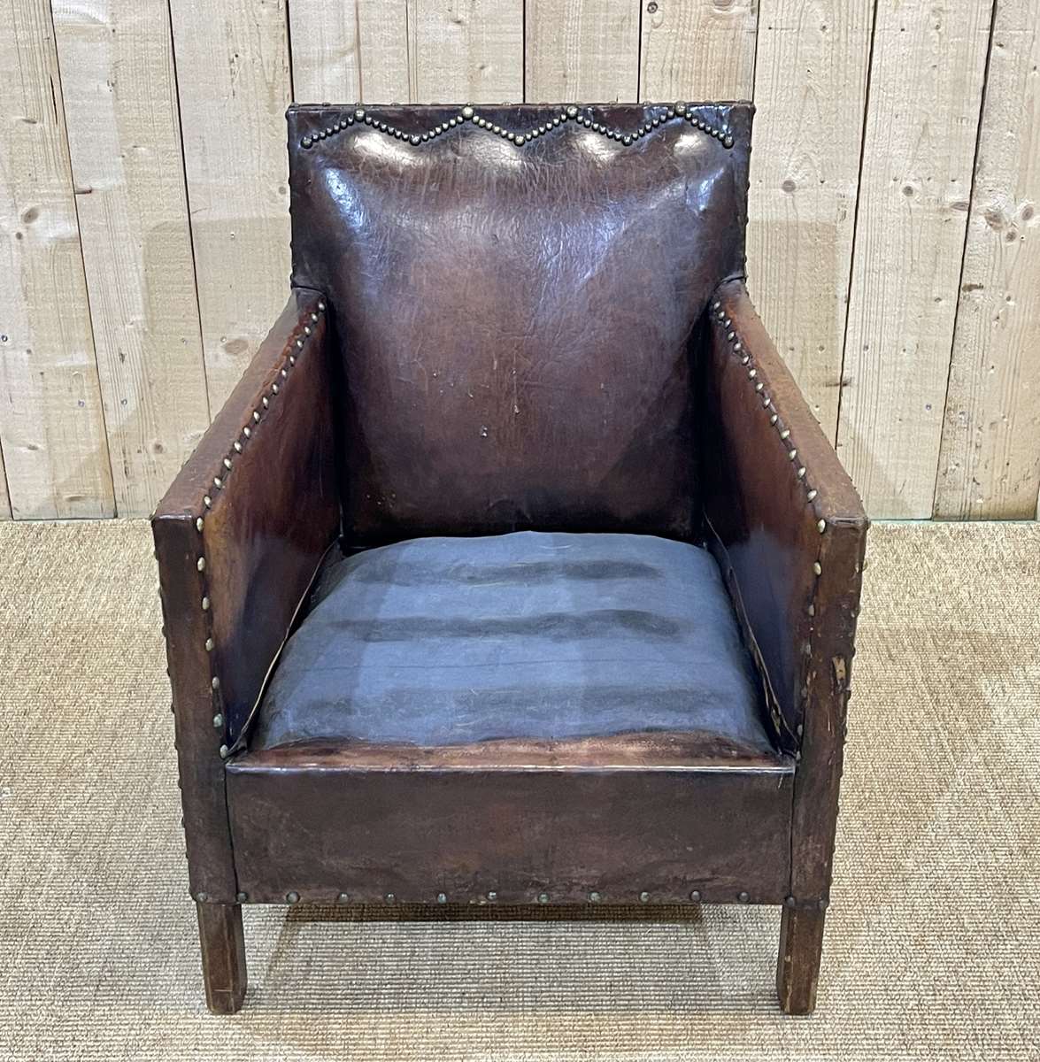 Club armchair art deco era leather and fabric cushion