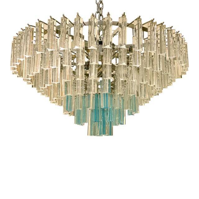 Contemporary transparent and ligh-blue triedro murano glass chandelier