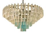 Contemporary transparent and ligh-blue triedro murano glass chandelier