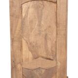 Porte de placard en bois panneauté et sculpté