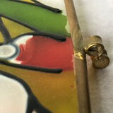 Glass box and hexagonal brass enamelled floral decoration