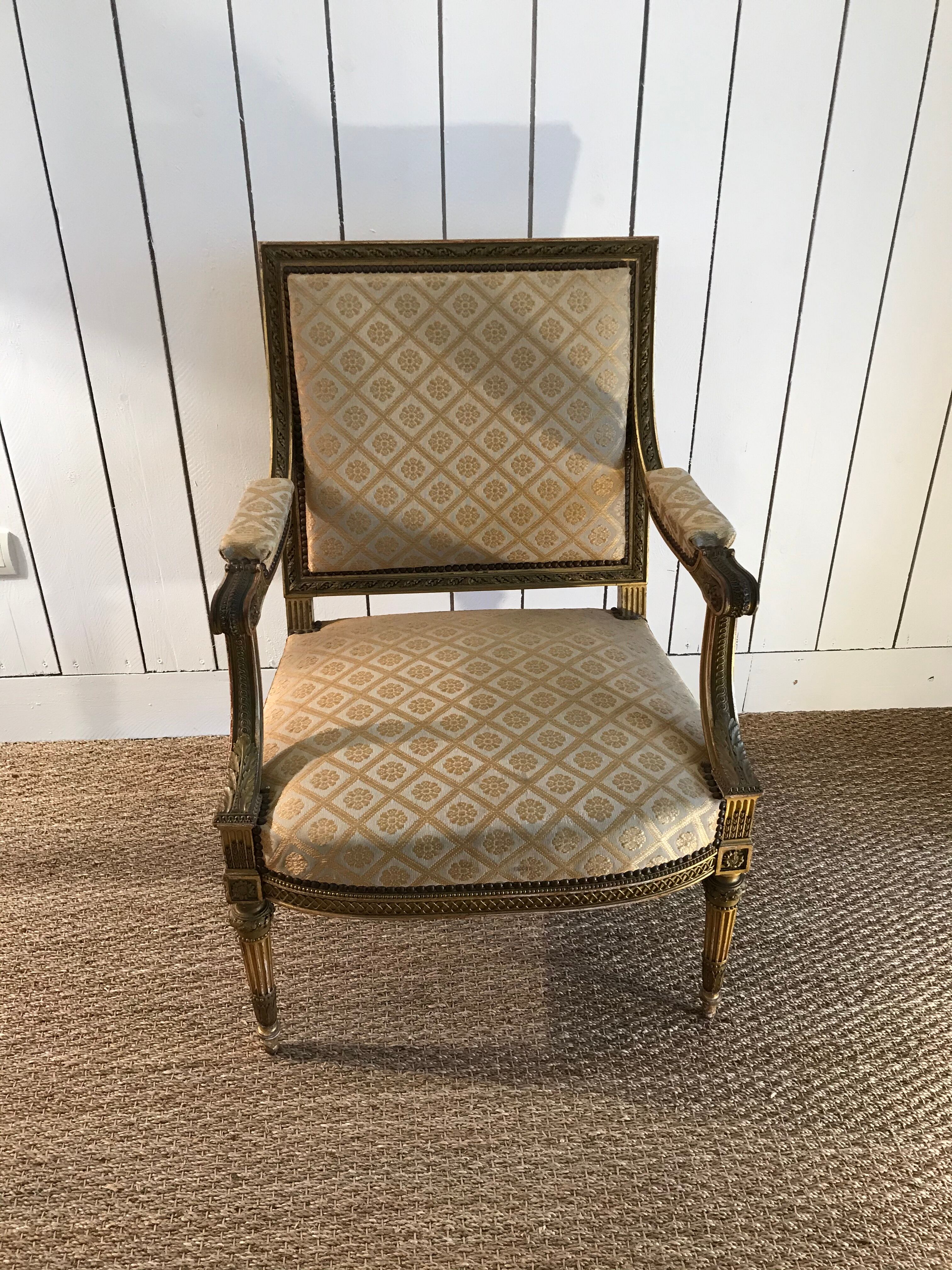 Louis XVI armchair in gilded wood carved and molded
