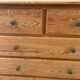 Natural pine chest of drawers - green knobs